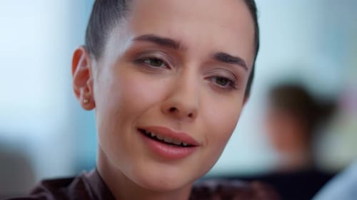 Closeup Attractive Businesswoman Talking During Video Job Interview. Smiling Female Executive Online