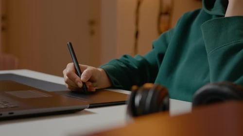 Drawing on Tablet with Stylus Indoors