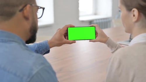 Multi Ethnic People Holding Smartphone with Chroma Key