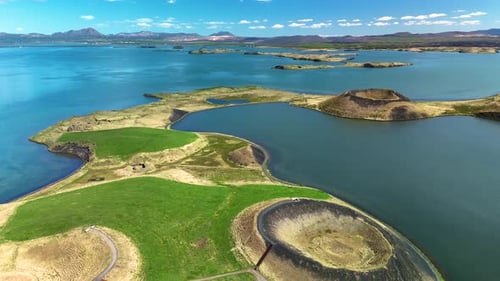 Explore Breathtaking Landscapes of Iceland with Stunning Volcanic Craters and Serene Waters