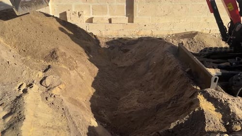 Scooping Digging soil sand hole earthworks digger construction Perth