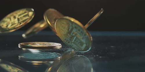 Gold Bitcoins Falling in Slow Motion