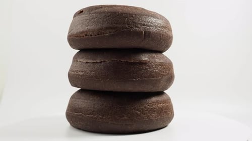 Stack of Three Chocolate Donuts Rotating
