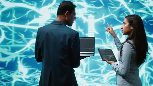 Workers Using Artificial Intelligence Deep Learning to Look at Data