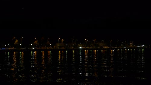 Reflection in the Water at Night Embankment