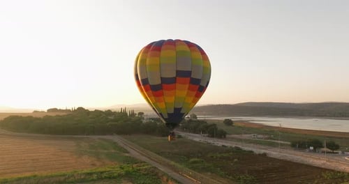 Hot Air Balloon Flight Over Picturesque Rural Landscape