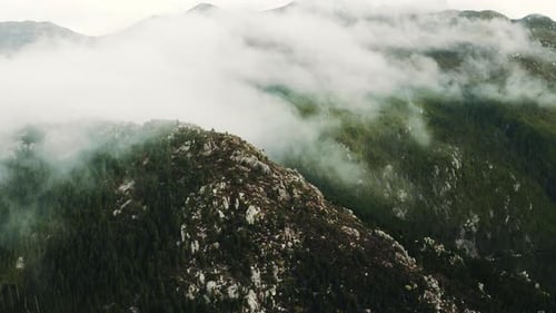 Clouds covering a mountain