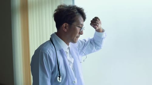 A doctor is sad in hospital