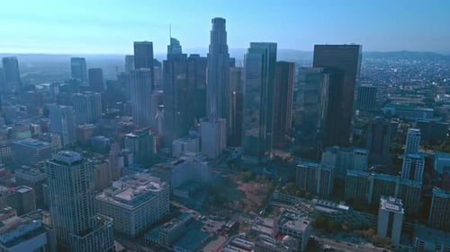 Downtown Los Angeles Skyline - Drone Flight Among City Skyscrapers - Sunny Afternoon