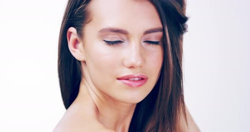 Close Up of Beautiful Woman Posing with Hair