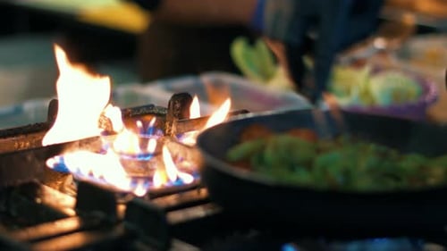Closeup Chef Hands Cooking Healthy Food at Kitchen Restaurant. Male Hands Stirring
