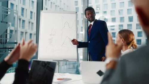 Corporate Presentation by Businessman in a Modern Office