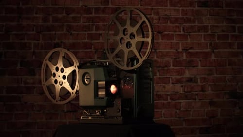 Vintage Movie Projector with Film Reels Illuminated