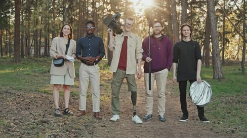 Full-Shot Portrait Of Filming Crew In Forest