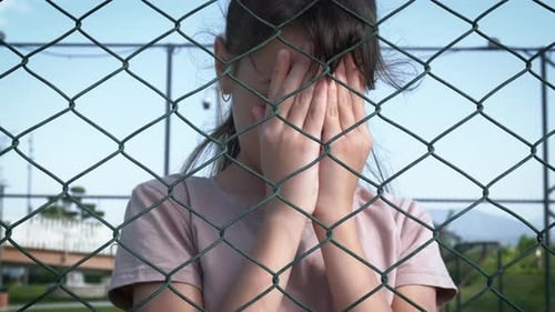 Schoolgirl Crying From Bullying at School