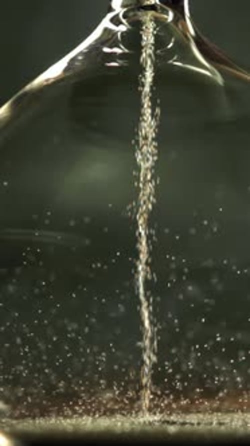 Super Slow Motion Sand Fall in the Hourglass Filmed on a Highspeed Camera at 1000 Fps