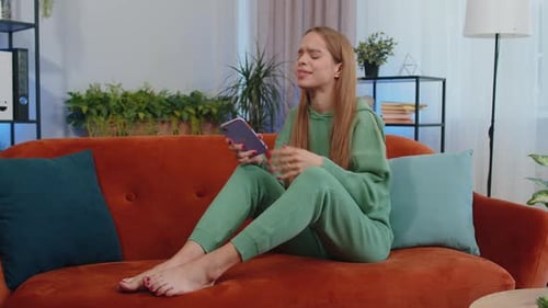 Woman Reacts to Bad News on Her Phone