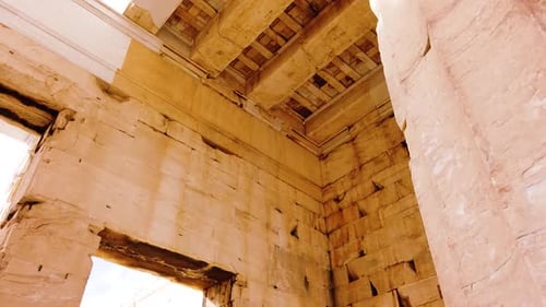 The Propylaea, the monumental gateway to the Acropolis of Athens. Inside moving shot.