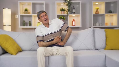 Old man with stomachache.