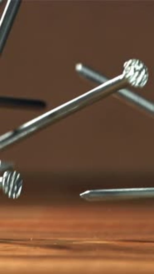Nails Fall on the Carpenter's Worktable Filmed on a Highspeed Camera at 1000 Fps