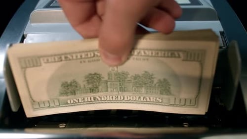 Money counting machine counts dollars at high speed