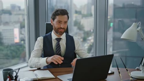 Cheerful hr manager conducts online interview with positive candidate at modern office