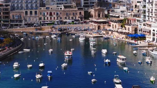 Aerial Daytime View of Sliema Harbor Malta with Boats and Quay
