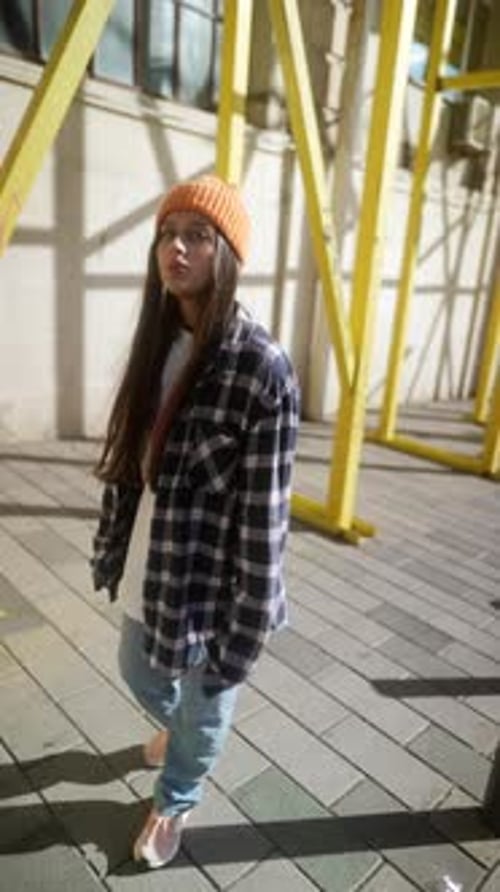 Chic Street Style Showcased in a Vibrant Urban Setting with Colorful Accessories and Attire