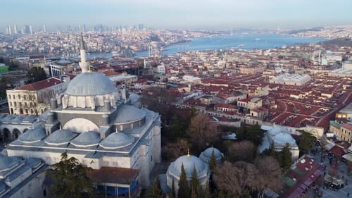 Grand Bazaar and Beyazıt Mosque in Istanbul, Turkey. Drone rising up to city skyline, Showing Fatih,