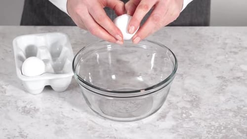 Mixing Ingredients to Bake Unicorn Rainbow Chocolate Cupcakes