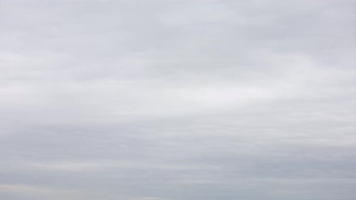 Puffy fluffy white clouds. Cumulus cloud cloudscape timelapse. Winter white sky time lapse. White cl