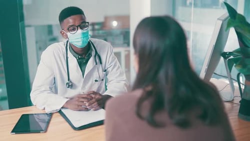 Doctor Consults with Patient in Modern Office