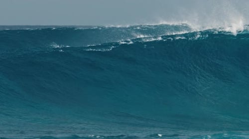 Ocean Wave Rolls and Breaks in the Maldives