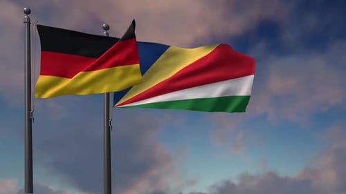 Flags of Germany and Seychelles Waving in Cloudy Sky