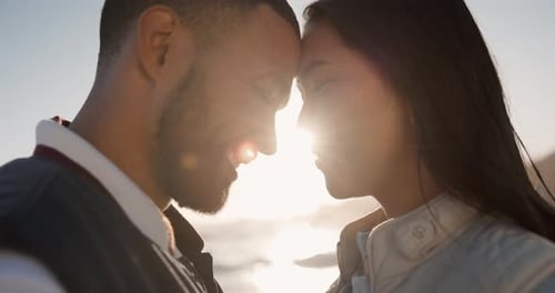 Forehead, beach and couple with love, marriage and lens flare with commitment, trust and smile