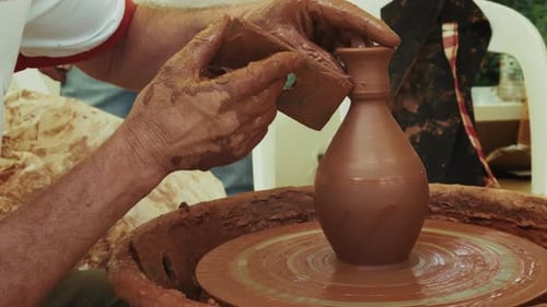 Shaping A Clay Pot In A Ceramics Workshop 55
