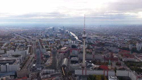 Aerial Footage Orbiting Iconic Fernsehturm and Alexanderplatz Train Station in Berlin Germany