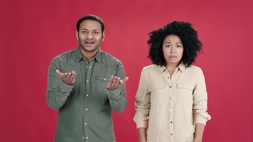 Multiracial People Stare and Stretch Hands in Confusion