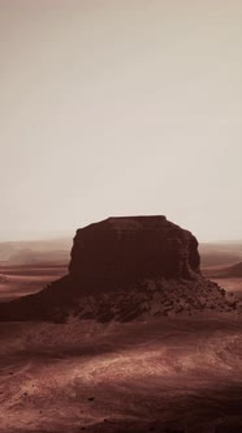 Massive Rock Formation in Desert