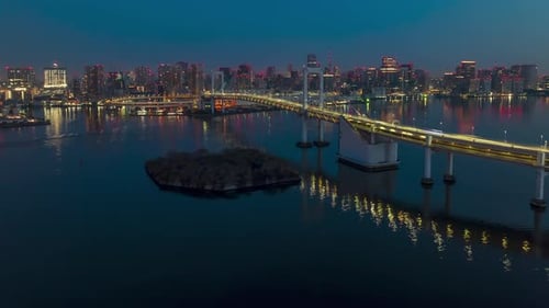 Aerial Hyperlapse over Tokyo an Rainbow Bridge at sunrise