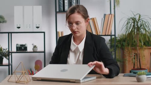 Caucasian Business Woman Freelancer at Office Start Working on Laptop Computer Sends Online Messages