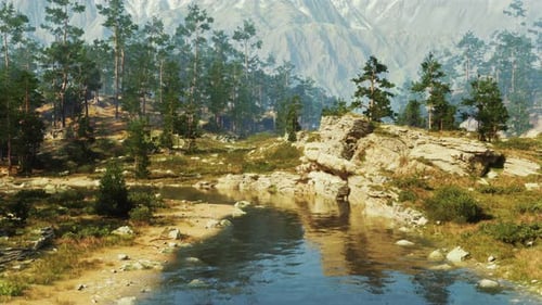 A Picturesque Mountain Landscape with a Flowing Stream in the Foreground
