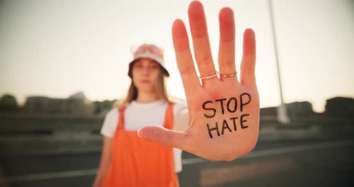 Young Adult Promoting Message to Stop Hate