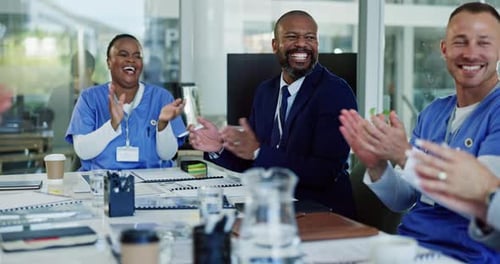 Happy people, nurses and applause for teamwork for success, collaboration or goals at hospital