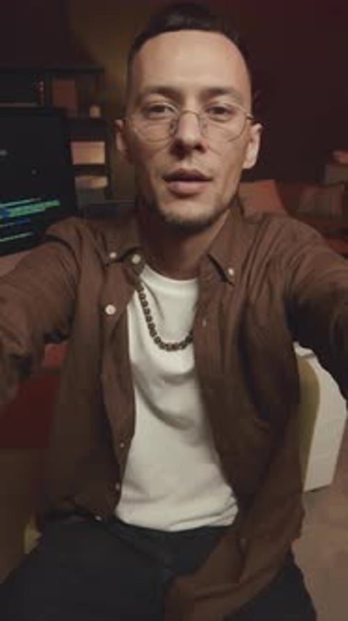 POV of Software Engineer Working at Night Office