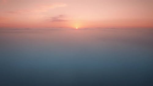 Sun is rising above the beautiful ocean of clouds at sunrise.