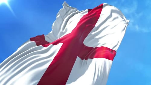 England Flag Waving Against Blue Sky