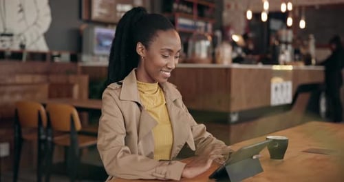 Happy, coffee shop and black woman with a tablet, typing and search internet with connection