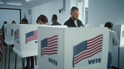 Male Citizen Comes to Vote in Booth in Polling Station Office