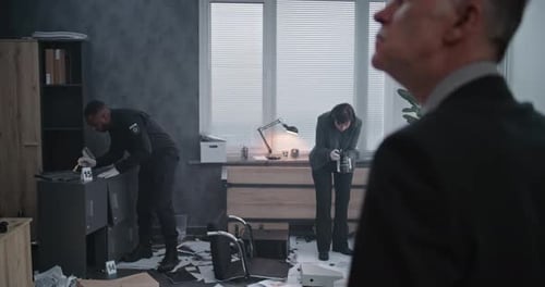 Office Robbery Case Crime Investigation Team Working at Crime Scene